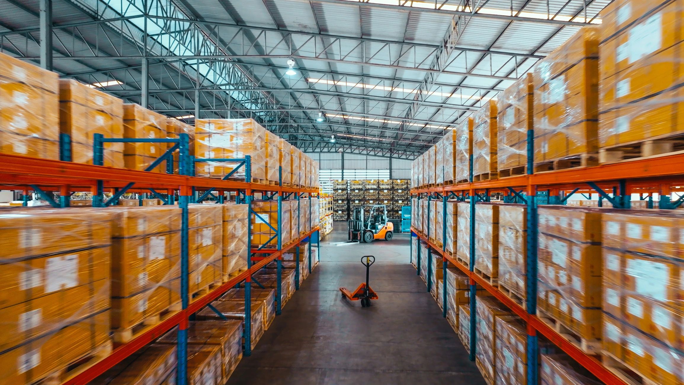 Warehouse shelves with packaged inventory ready for shipping