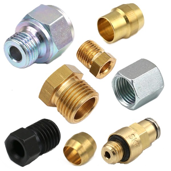 Metal plumbing and threaded fitting components arranged on a white background
